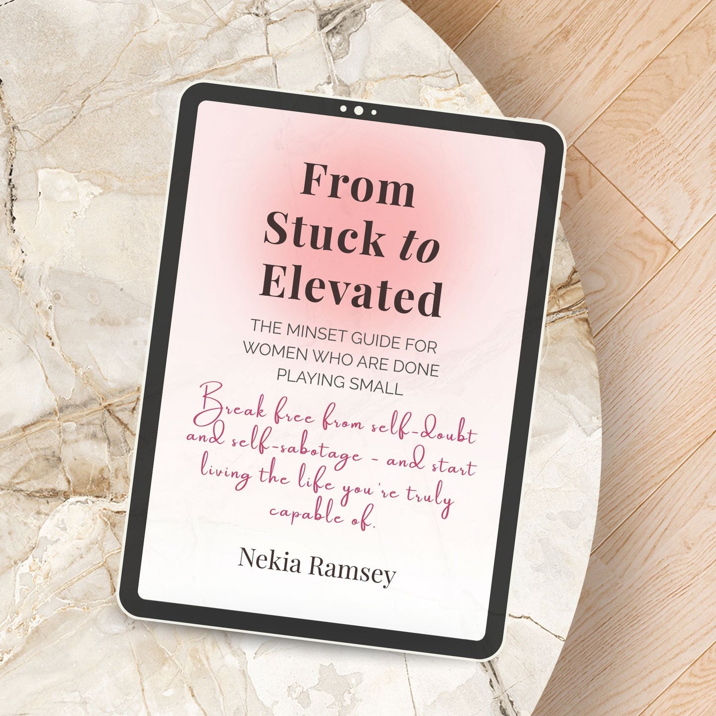Digital mockup of the From Stuck to Elevated e-book displayed on a tablet laying on a coffee table — a calming setup symbolizing growth and reflection.